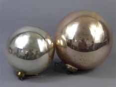 Two Large Mirrored Glass Witches Balls