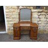 An Oak Gothic Arts & Crafts Style Mirrored Knee-hole Dressing Table