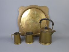 An Arts and Crafts-Style Indian Brass Tea Set with Tray