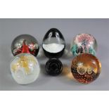 A Collection of Six Caithness Glass Paperweights.