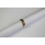A 9ct Yellow Gold and Diamond Ring