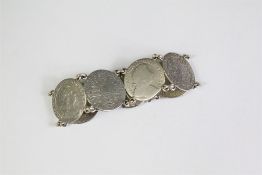 A Silver Coin Bracelet.