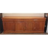 A Large Polished Pine Sideboard