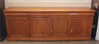 A Large Polished Pine Sideboard