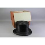 A Vintage Black Top Hat.