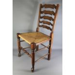 Eight Antique Ladder Back Chairs.