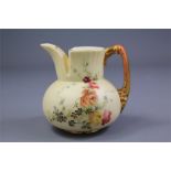 A Royal Worcester Hand Painted Jug.