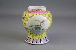 An Early 20th Century Yellow Enamel Vase.