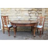 A Large Oval Mahogany Dining Table