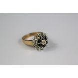 A 9ct Gold Sapphire and Diamond Floral Ring