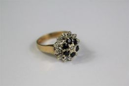 A 9ct Gold Sapphire and Diamond Floral Ring