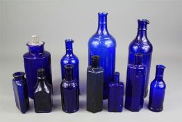 A Collection of Antique and other Blue Glass Bottles.