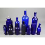 A Collection of Antique and other Blue Glass Bottles.