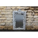 A Large Grey-Painted Over Mantel Mirror