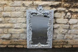 A Large Grey-Painted Over Mantel Mirror