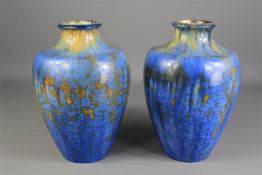 Pierre Ponas, A Pair of Marbled Blue Vases.