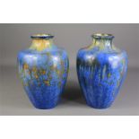 Pierre Ponas, A Pair of Marbled Blue Vases.