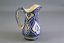 A Persian Blue and White Jug.