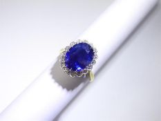 A Classic 5.25ct Royal Blue Natural Ceylonese Sapphire & Diamond Ring