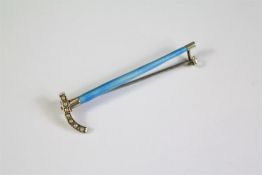 A Silver and Blue Enamel Stock Brooch