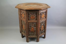 A Circa 1900 Anglo-Indian Hardwood Octagonal Folding Campaign Table