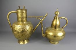 Two Brass Islamic Ewers