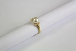 A Ladies 18ct Yellow Gold Pearl and Diamond Ring