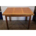 A Gordon Russell Light Oak Extending Dining Table