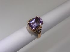 A 14ct Rose Gold Amethyst and Diamond Ring