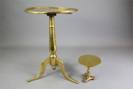 An Antique Brass Trivet and Miniature Brass Table