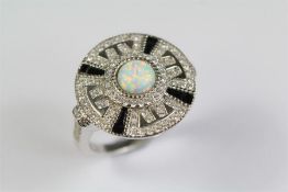 An Art Deco Style Silver Opalite and Sapphire Dress Ring