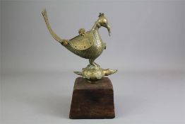 An Antique Indian Figure of a Peacock.