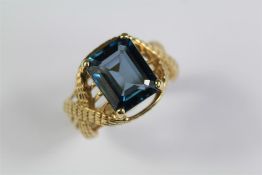 A Lady's 9ct Yellow Gold Blue Topaz Ring