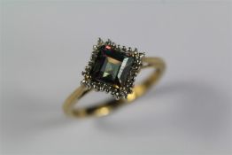 A 9ct Yellow Gold Topaz and Diamond Ring