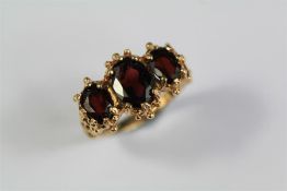 A 9ct Yellow Gold Garnet Ring