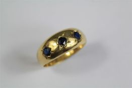 An 18ct Yellow Gold and Sapphire Ring