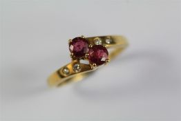An 18ct Yellow Gold Ruby and Diamond Ring