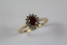 A 9ct Yellow Gold Ruby and Diamond Ring