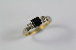 An 18ct Yellow Gold and Platinum Sapphire and Diamond Ring