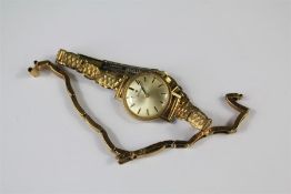 A Lady's 9ct Yellow Gold Tissot Wrist Watch