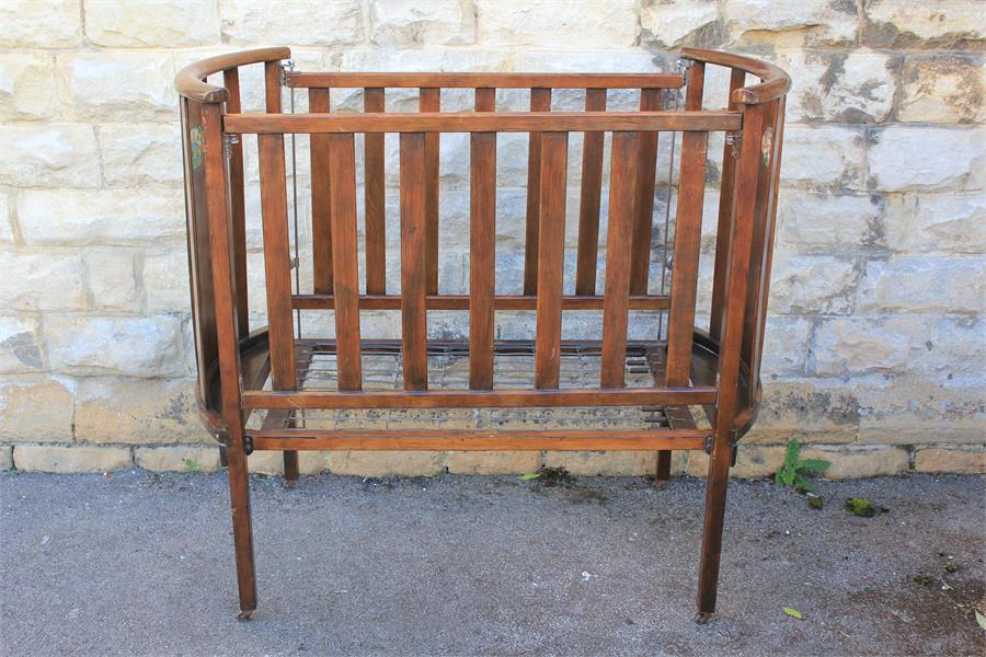 An Edwardian Mahogany Infant Cot