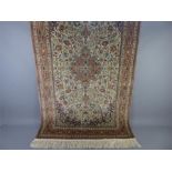 A Fine Silk Hereke Isfahan Carpet