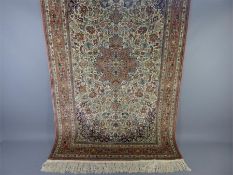 A Fine Silk Hereke Isfahan Carpet