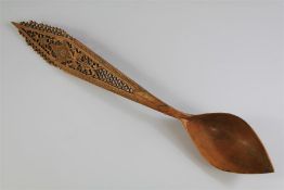 A 19th Century Persian Pierced Carved-Wood Sherbert Spoon.