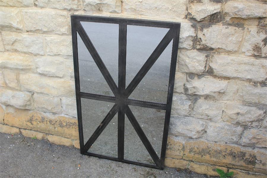 A Rectangular Metal-Framed Mirror