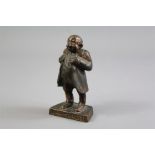 A Bronze Caricature Figurine of a Jewish Businessman