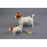 Three Ceramic Beagle Dog Figures