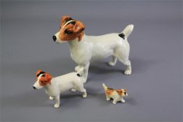 Three Ceramic Beagle Dog Figures