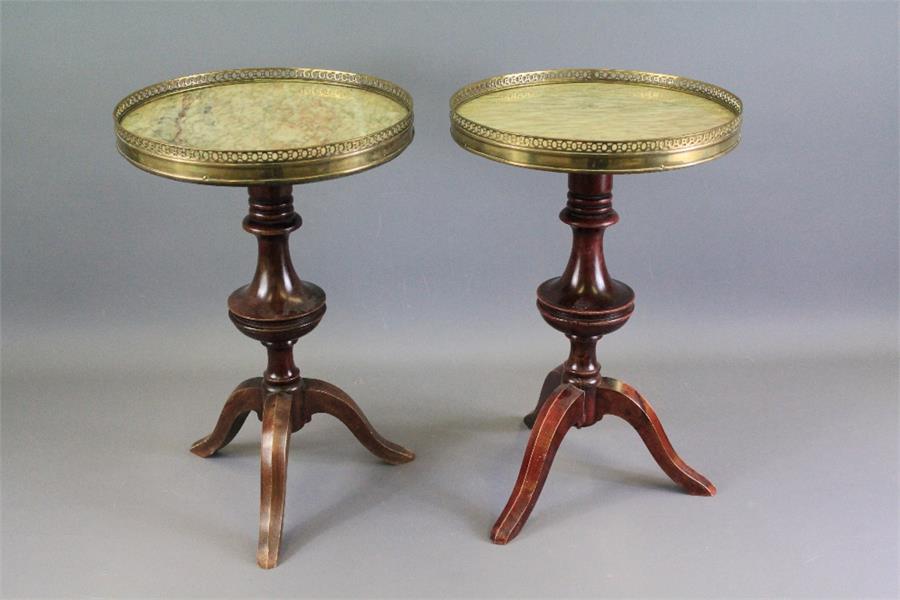 A Pair of Circular Marble Topped Occasional Tables