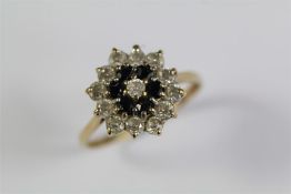 A 9ct Yellow Gold and Sapphire Cluster RIng